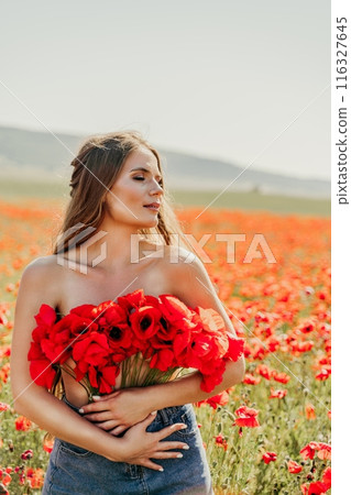 Woman poppies field. portrait happy woman with long hair in a poppy field and enjoying the beauty of nature in a warm summer day. Woman poppies field. portrait happy woman with long hair in a poppy field and enjoying the beauty of nature in a warm summer day. 116327645