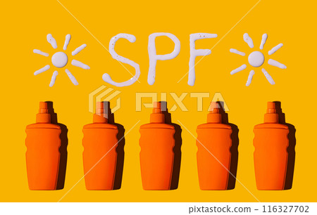 Sunscreen SPF sunblock cream on yellow background Sunscreen SPF sunblock cream on yellow background 116327702