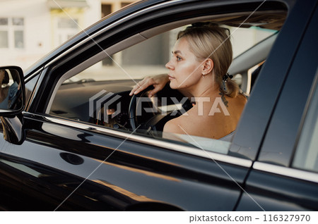 Woman Contemplating While Driving 116327970