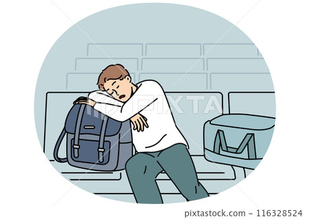 Sleeping man sits in lounge area at airport and waits for arrival plane delayed due to bad weather 116328524