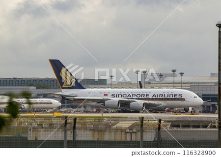 Airbus A380 Airplane Of Singapore Airlines At Changi International Airport, Singapore. Airbus A380 Airplane Of Singapore Airlines At Changi International Airport, Singapore. 116328900