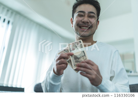 A man with a lot of money A man with a lot of money 116330106