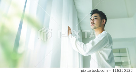 Man waking up in the morning 116330123