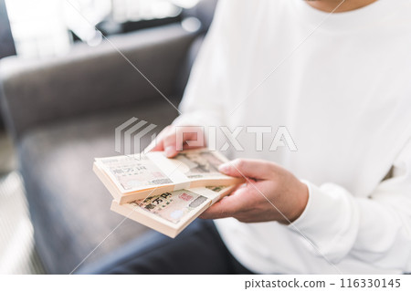 Man with cash Man with cash 116330145