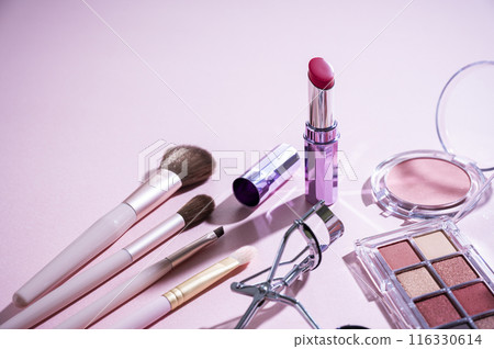 Eyeshadow palette, eyelash curler, makeup brush, lipstick and blush Eyeshadow palette, eyelash curler, makeup brush, lipstick and blush 116330614