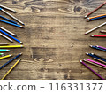Background. Wooden table with multicolor pencils 116331377