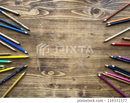 Background. Wooden table with multicolor pencils 116331377