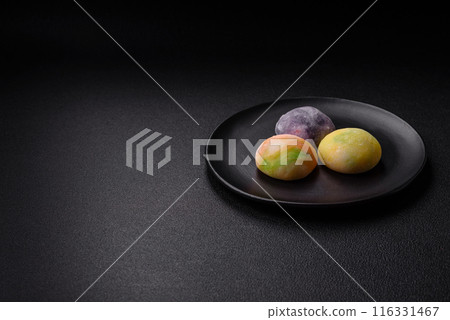 Delicious sweet chilled mochi desserts with fruit filling Delicious sweet chilled mochi desserts with fruit filling 116331467