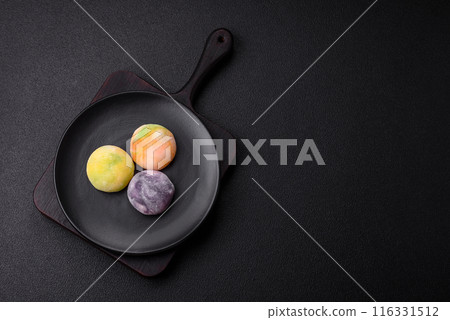 Delicious sweet chilled mochi desserts with fruit filling Delicious sweet chilled mochi desserts with fruit filling 116331512