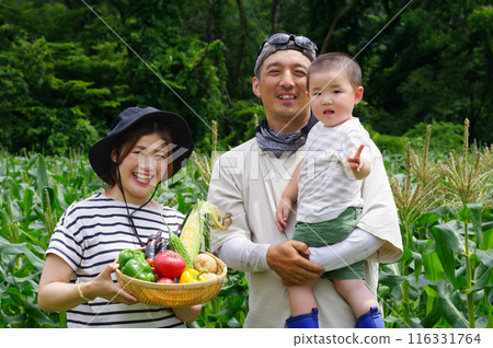 A family farming surrounded by nature A family farming surrounded by nature 116331764