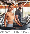 A young woman and man in the gym 116333575