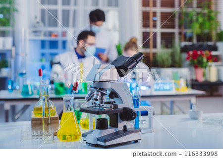 Scientist and people in science exam, test or group project in experiment or assignment at laboratory. 116333998
