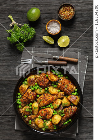 Chicken Vesuvio in a baking dish, top view Chicken Vesuvio in a baking dish, top view 116334200