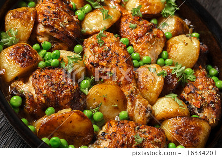 Chicken Vesuvio in a baking dish, top view 116334201