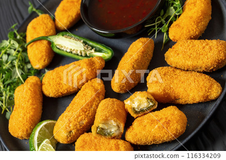 crispy baked cream cheese stuffed jalapeno poppers 116334209