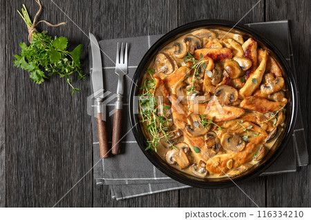 chicken stroganoff in a baking dish, top view chicken stroganoff in a baking dish, top view 116334210