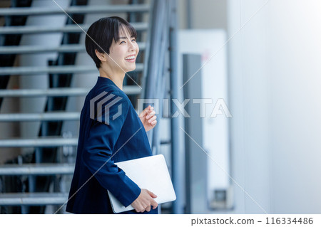 Young business woman in the office Young business woman in the office 116334486