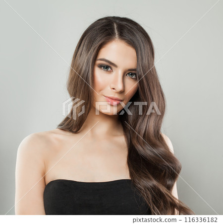 Cheerful young adult model woman with long healthy hairstyle, fresh shiny clear skin Cheerful young adult model woman with long healthy hairstyle, fresh shiny clear skin 116336182