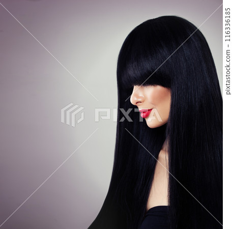 Elegant young model woman with long healthy dark straight smooth hair and make-up Elegant young model woman with long healthy dark straight smooth hair and make-up 116336185