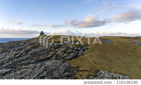 Aerial view a stone pillar at the beautiful coastline at Dawros in County Donegal - Ireland Aerial view a stone pillar at the beautiful coastline at Dawros in County Donegal - Ireland 116336190