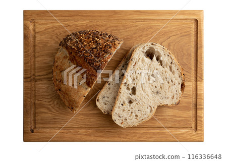fresh sliced homemade bread on wooden board isolated on white, top view fresh sliced homemade bread on wooden board isolated on white, top view 116336648