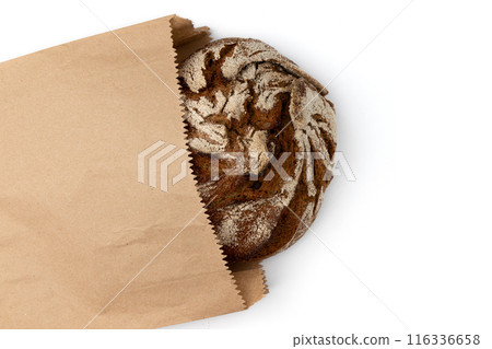 fresh rye bread in paper bag isolated on white background fresh rye bread in paper bag isolated on white background 116336658