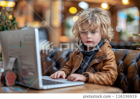 Child learning to code on a computer. 116336919
