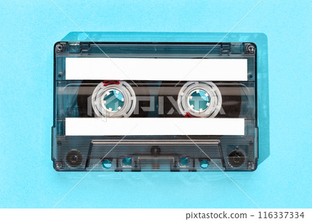 Old tape cassette with blank labels isolated on blue background, Template mock up Old tape cassette with blank labels isolated on blue background, Template mock up 116337334