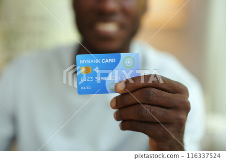 Man Holding His Credit Card Man Holding His Credit Card 116337524