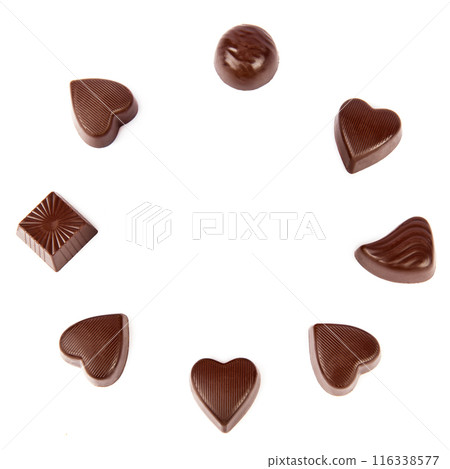 Chocolate candies isolated on white. Collage. Free space for text. Chocolate candies isolated on white. Collage. Free space for text. 116338577