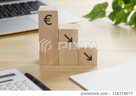 € Down arrow on a building block 116338677