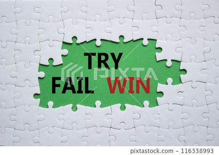 Try Fail Win symbol. Concept words Try Fail Win on white puzzle. Beautiful green background. Business and Try Fail Win concept. Copy space. 116338993