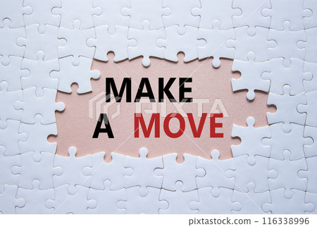 Make a Move symbol. Concept word Make a Move on white puzzle. Beautiful pink background. Business and Make a Move concept. Copy space 116338996