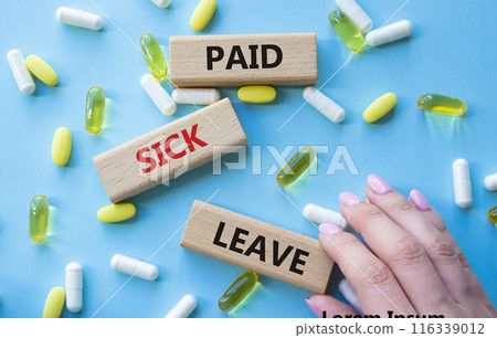 Paid Sick Leave symbol. Concept words Paid Sick Leave on wooden blocks. Beautiful blue background with pills. Doctor hand. Healthcare and Paid Sick Leave concept. Copy space. 116339012