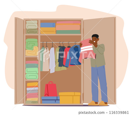 Man Organizing Clothes In A Neatly Arranged Wardrobe At Home, Carefully Inspecting A Shirt, Representing Tidiness Man Organizing Clothes In A Neatly Arranged Wardrobe At Home, Carefully Inspecting A Shirt, Representing Tidiness 116339861