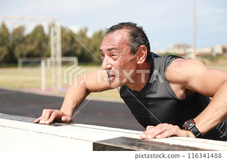 Push Ups On A Sunny Day At The Stadium Push Ups On A Sunny Day At The Stadium 116341488