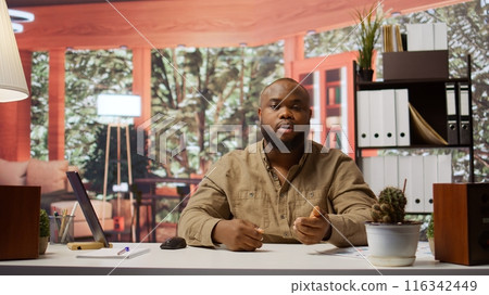 Entrepreneur presenting development strategies and funding plans to shareholders on remote conference call, using data to ensure economic growth. Businessman discussing with investors. Camera B. Entrepreneur presenting development strategies and funding plans to shareholders on remote conference call, using data to ensure economic growth. Businessman discussing with investors. Camera B. 116342449