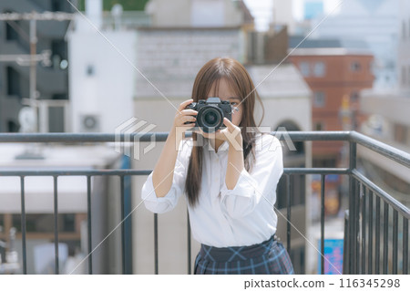 high school girl with camera high school girl with camera 116345298