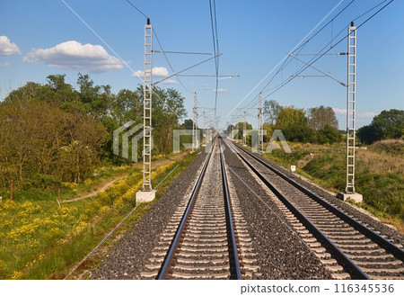 Rails with train, railway travel 116345536