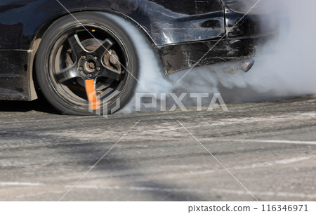 Smoke on wheel and Speed of drift race car. 116346971