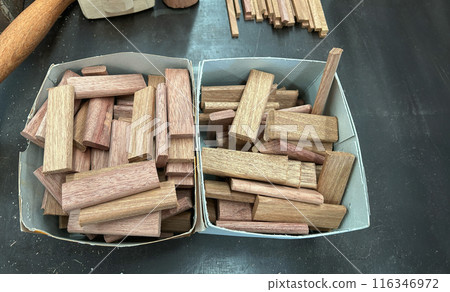 Wood dowel blocks for furniture joinery in workshop. Wood dowel blocks for furniture joinery in workshop. 116346972