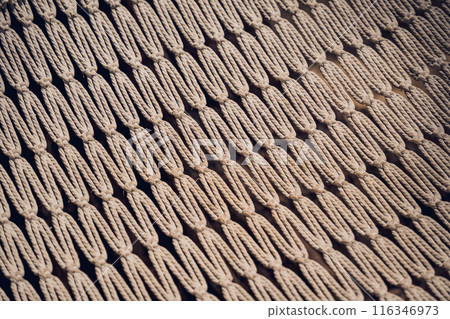 A detailed view of a knitted textile featuring a geometric design A detailed view of a knitted textile featuring a geometric design 116346973