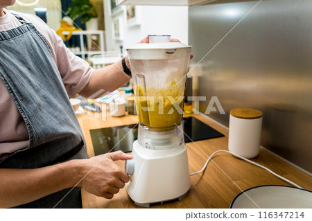 Chef at the kitchen preparing chickpea porridge with ginger Chef at the kitchen preparing chickpea porridge with ginger 116347214