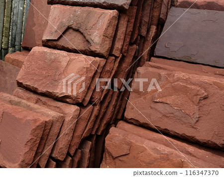 A collection of concrete tile is arranged on one another A collection of concrete tile is arranged on one another 116347370