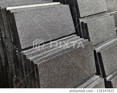 A collection of concrete tile is arranged on one another A collection of concrete tile is arranged on one another 116347625