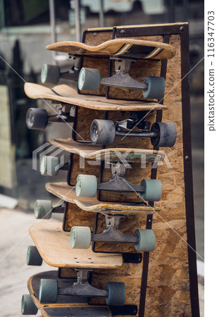 A stack of skateboards on a special outdoor stand A stack of skateboards on a special outdoor stand 116347703