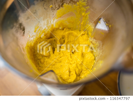 Chef at the kitchen preparing chickpea porridge with ginger Chef at the kitchen preparing chickpea porridge with ginger 116347797