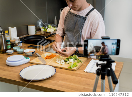 The chef is broadcasting live from workshop how to prepare a vegetarian lentils soup 116347812