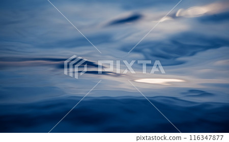 A image of blue ocean waves featuring a water surface in detail A image of blue ocean waves featuring a water surface in detail 116347877
