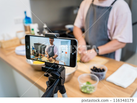 The chef is broadcasting live from workshop how to prepare a vegetarian food The chef is broadcasting live from workshop how to prepare a vegetarian food 116348179